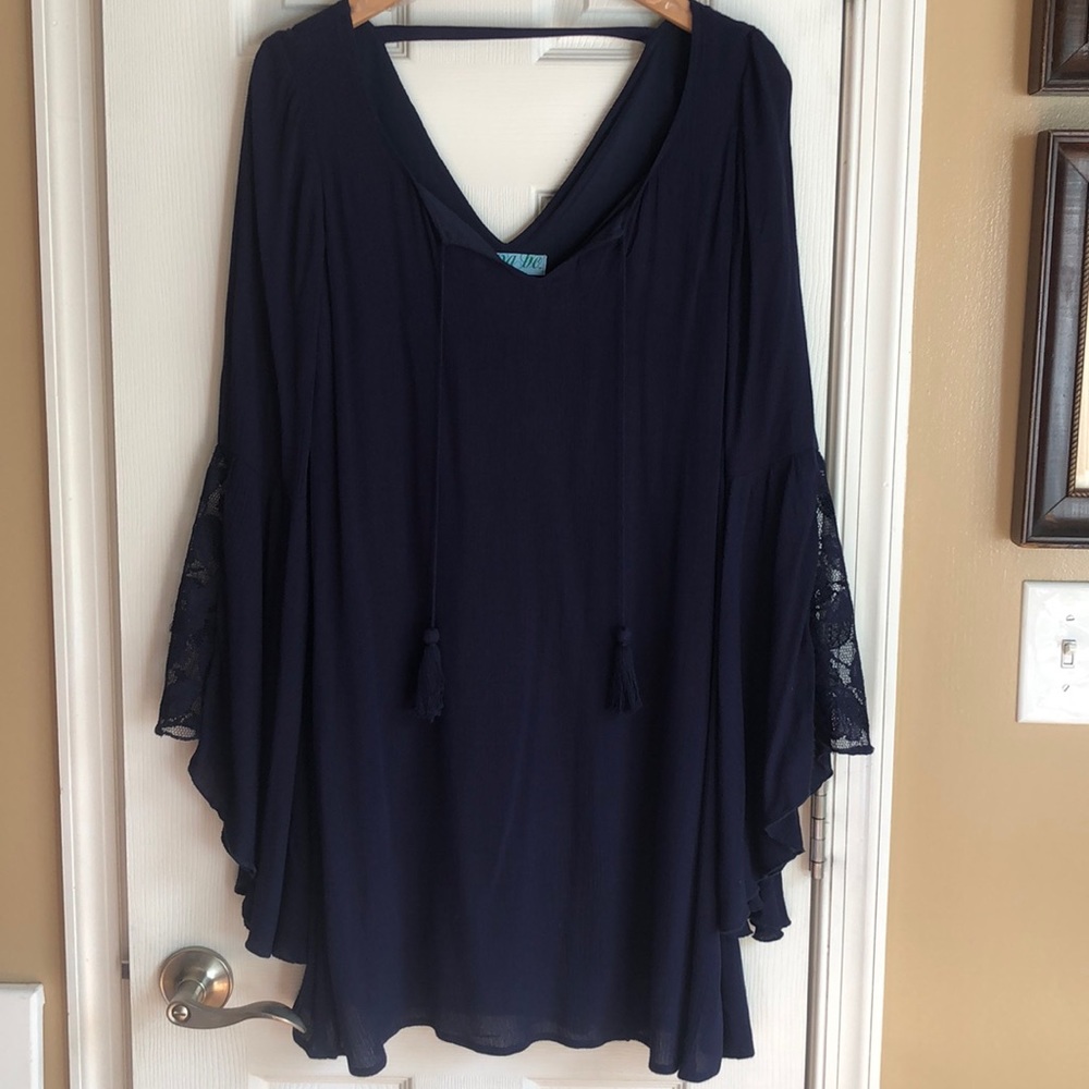 Boutique dress with lace bell sleeves